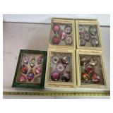 4 boxes of 5 , 1 box of 7 ornaments, glass