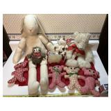 Lot of stuffed animals, some are homemade