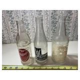 3 vintage beverage bottles