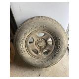 P265/75 R16 tire on rim, looks like new tire