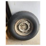 P235/75R15 tire on rim