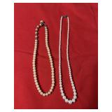 2 pearl looking necklace 1 marked sterling