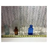 11 vintage bottles,includes Lysol,Milk of Magnesia
