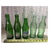 5 green beverage bottles, coke marked Baltimore MD