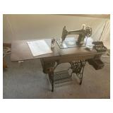 Vintage Singer treadle sewing machine, wooden