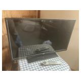 RCA flat screen tv 32 in on stand