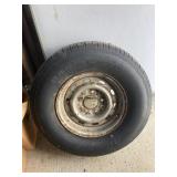 P235/75R15 tire on rim