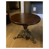 Table 18"round w/brass looking base, 16" tall,