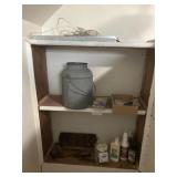 Contents of shelves above steps