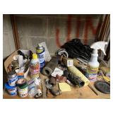 Plumbing and contents of shelf