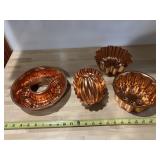 4 copper colored mold decor