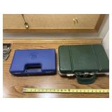 2 gun cases, green 14x9x4 & blue 12 1/2 x 8x3