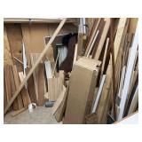 Large pile wood, trim and more in corner