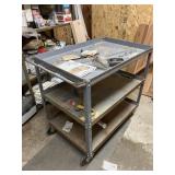 Rolling cart with contents 24ï¿½ x 36ï¿½ x 35ï¿½ H
