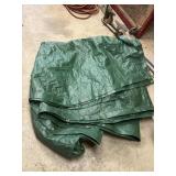 Large green tarp, size unknown