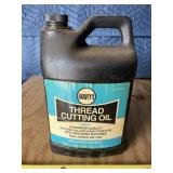 Thread cutting oil, over 1/2 full