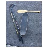 Skateboard, hockey sticks, oar