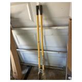Post hole digger with fiberglass handles