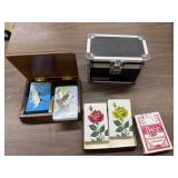 4 new 1 used deck of cards &small case