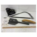 Saws, shovel, inflator untested
