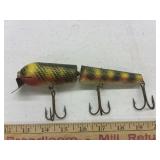 vintage Creek Chub jointed fishing lure in a