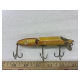 vintage wooden jointed fishing lure, resembling a