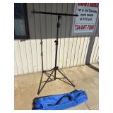 Adjustable tripod with carrying bag