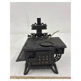 Vintage miniature cast iron "Queen" brand stove