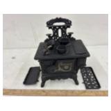 Vintage cast iron miniature "Cresent" wood burning