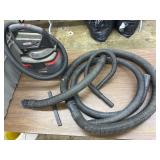 Tote with shopvac hose & battery operated shop vac