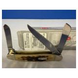 Case XX Amber Bone Peach Seed Jig Medium Stockman