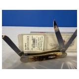 Case XX Amber Bone Peach Seed Jig Medium Stockman