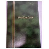 AN ALBUM OF USA FIRST DAY COVERS