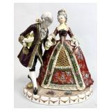 PORCELAIN SCULPTURE OF COUPLE IN COURT DRESS