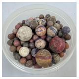 COLLECTION OF CLAY MARBLES