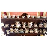 COLLECTION OF TEA CUPS AND SAUCERS
