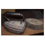 (2) Antique Cast Sad Irons w/ (1) Rest