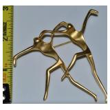 AJC Goldtone Modernist Dancers Brooch