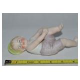 Vtg Porcelain Piano Baby in Hat Stretching 776
