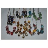 Collection of Charm Slide Beads w/ 9 Chains