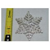 Silvertone Clear Rhinestone Snowflake Brooc