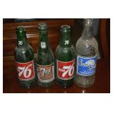 (4) Vintage Glass Soda Bottles: 7Up, 76 & Sun