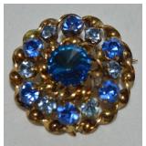 Vtg Goldtone Blue Rhinestone Round Brooch 1.25"