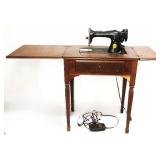 Singer Sewing Machine In Cabinet