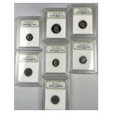 (7) Assorted US Encased Coins w/ Steel Cents