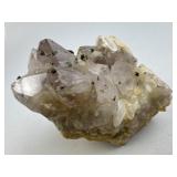 Natural Amethyst Spirit Quartz Cluster on a Yellow