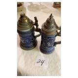 Two vintage bluestone needed German beer steins,