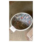 Ceramic flower pot , has red letters on bottom