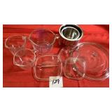 Two Pyrex, one Anchor Hocking measuring cups. Two