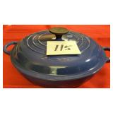 Le Creuset Shallow Round Oven cast-iron cookware.